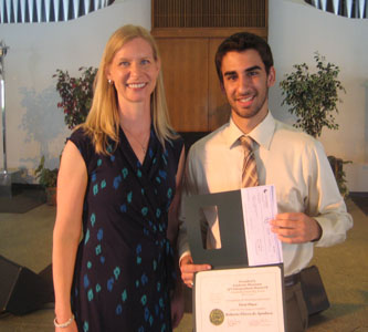 Robby Flores (right) with Dr. Melinda Schulteis(left)
